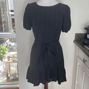 Beautiful black dress with a belt    Perfect for a night out